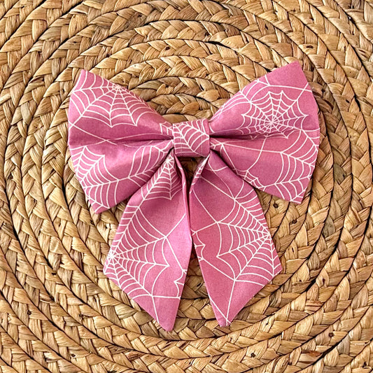 Caught In Your Webb Sailor Bow